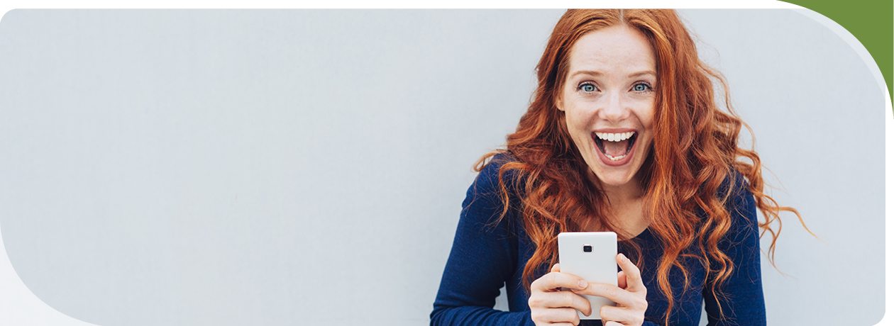 Compass CCU Member benefits image of woman excited hold cellphone